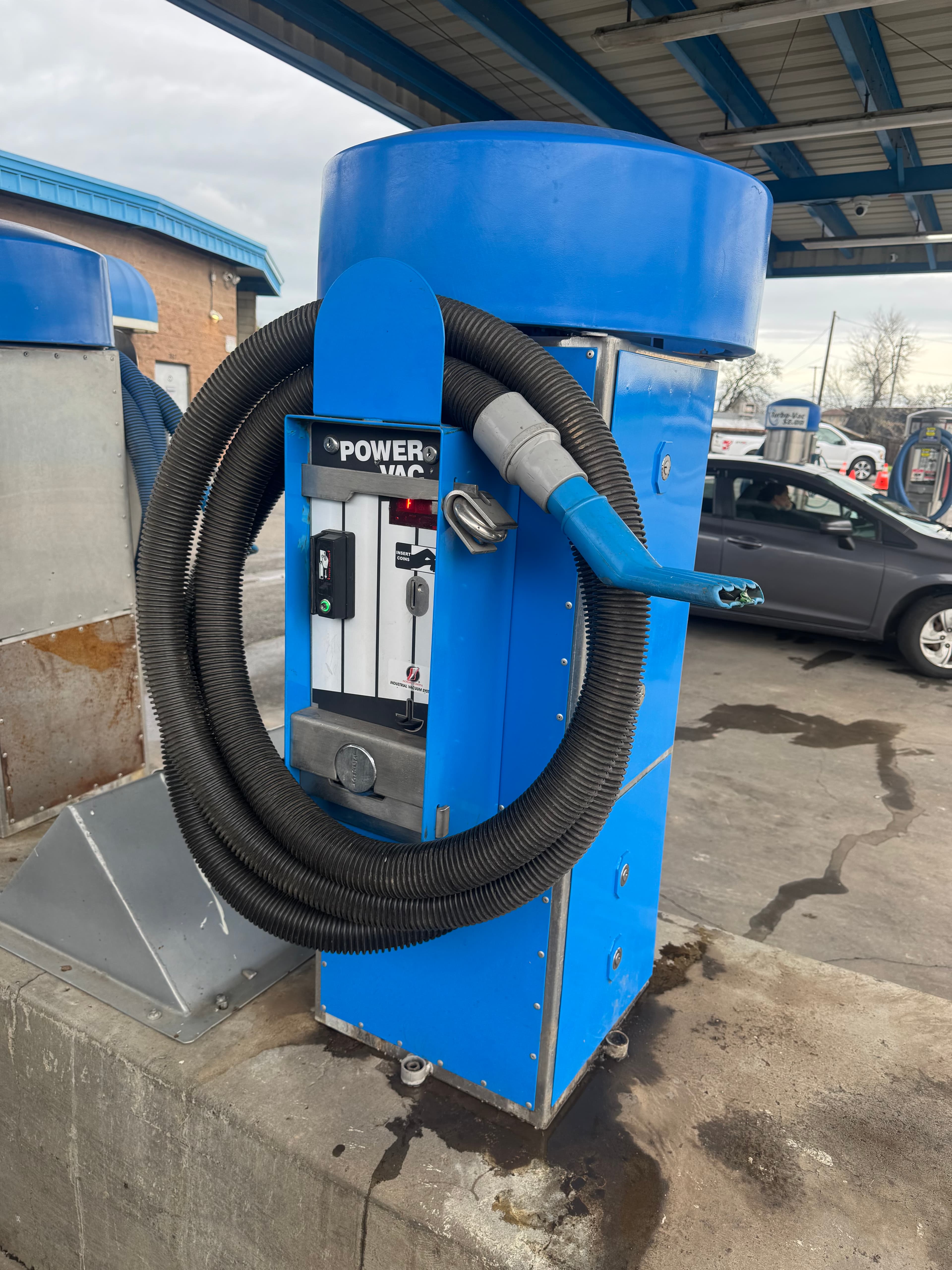 Completed blue SquareVac installation at a car wash